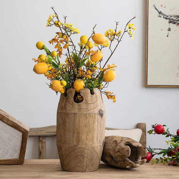 Elegant Mule Vase showcasing Nordic design, handcrafted from wood, available in four sizes.