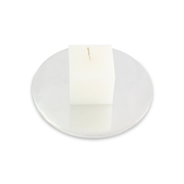 A stylish multi-purpose round candle holder made of recycled aluminum, showcasing a minimalist design suitable for modern decor.