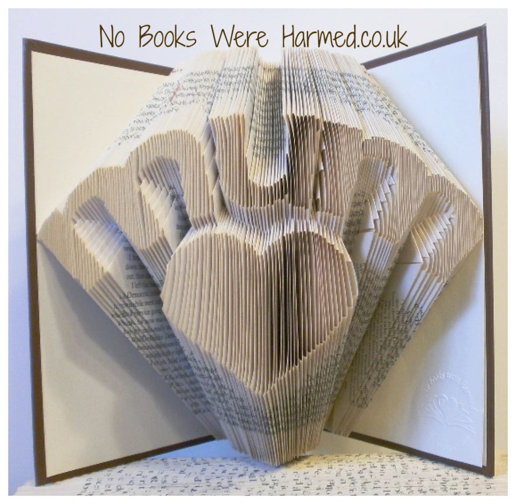 Handcrafted 'Mum' over love heart art made from vintage book pages, showcasing intricate folds and unique design.