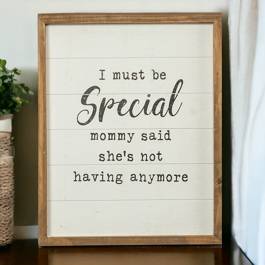 A rustic wooden sign reading 'Must Be Special', handmade with natural knots, perfect for nurseries and playrooms.