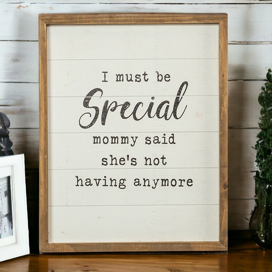 A rustic wooden sign reading 'Must Be Special', handmade with natural knots, perfect for nurseries and playrooms.