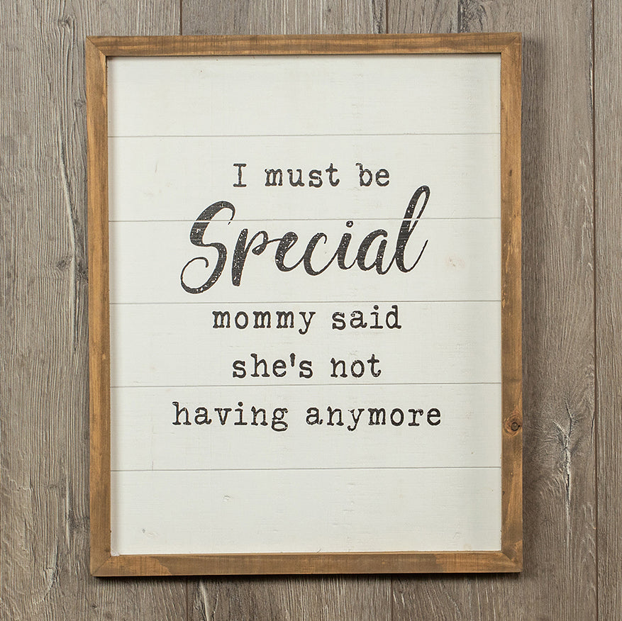 A rustic wooden sign reading 'Must Be Special', handmade with natural knots, perfect for nurseries and playrooms.