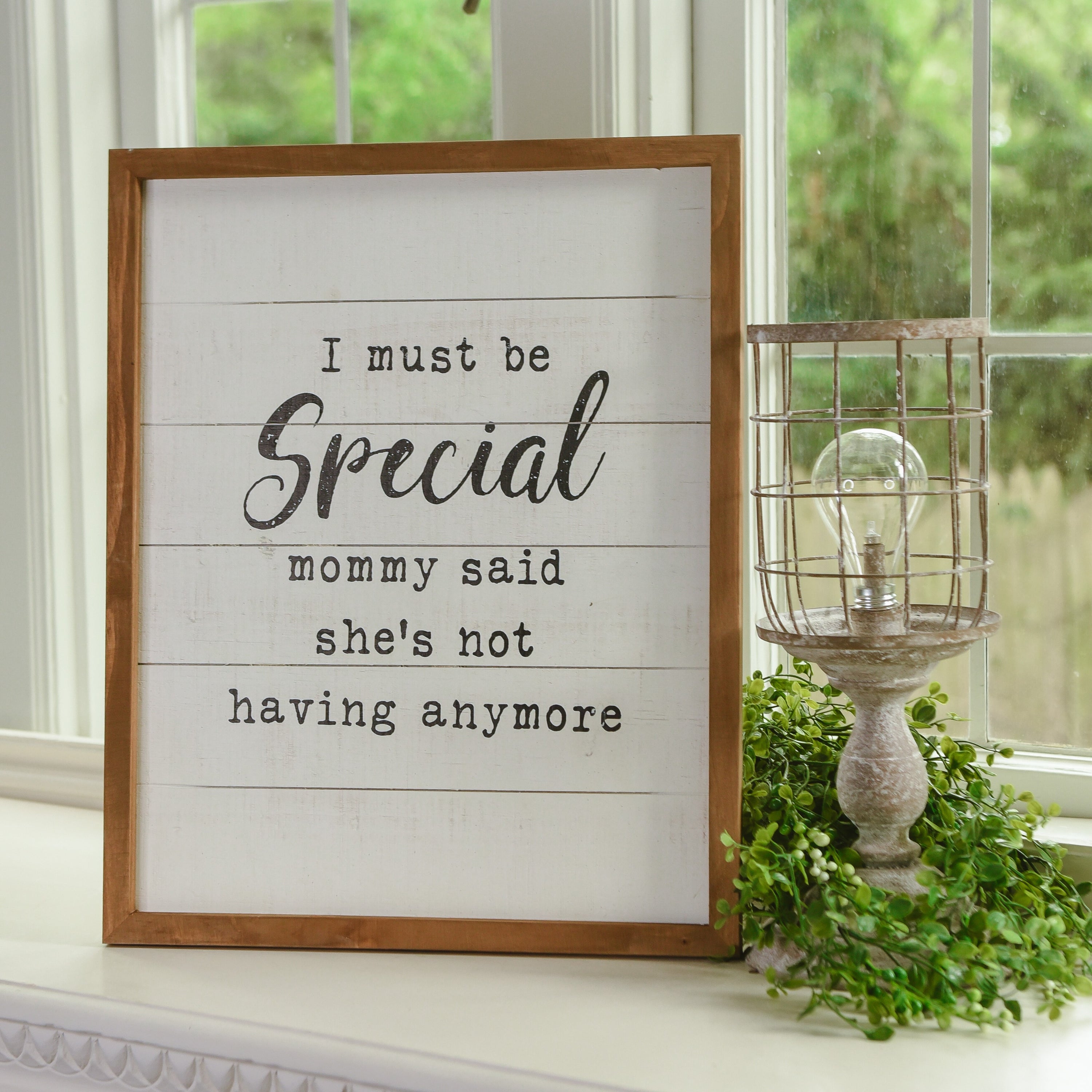 A rustic wooden sign reading 'Must Be Special', handmade with natural knots, perfect for nurseries and playrooms.