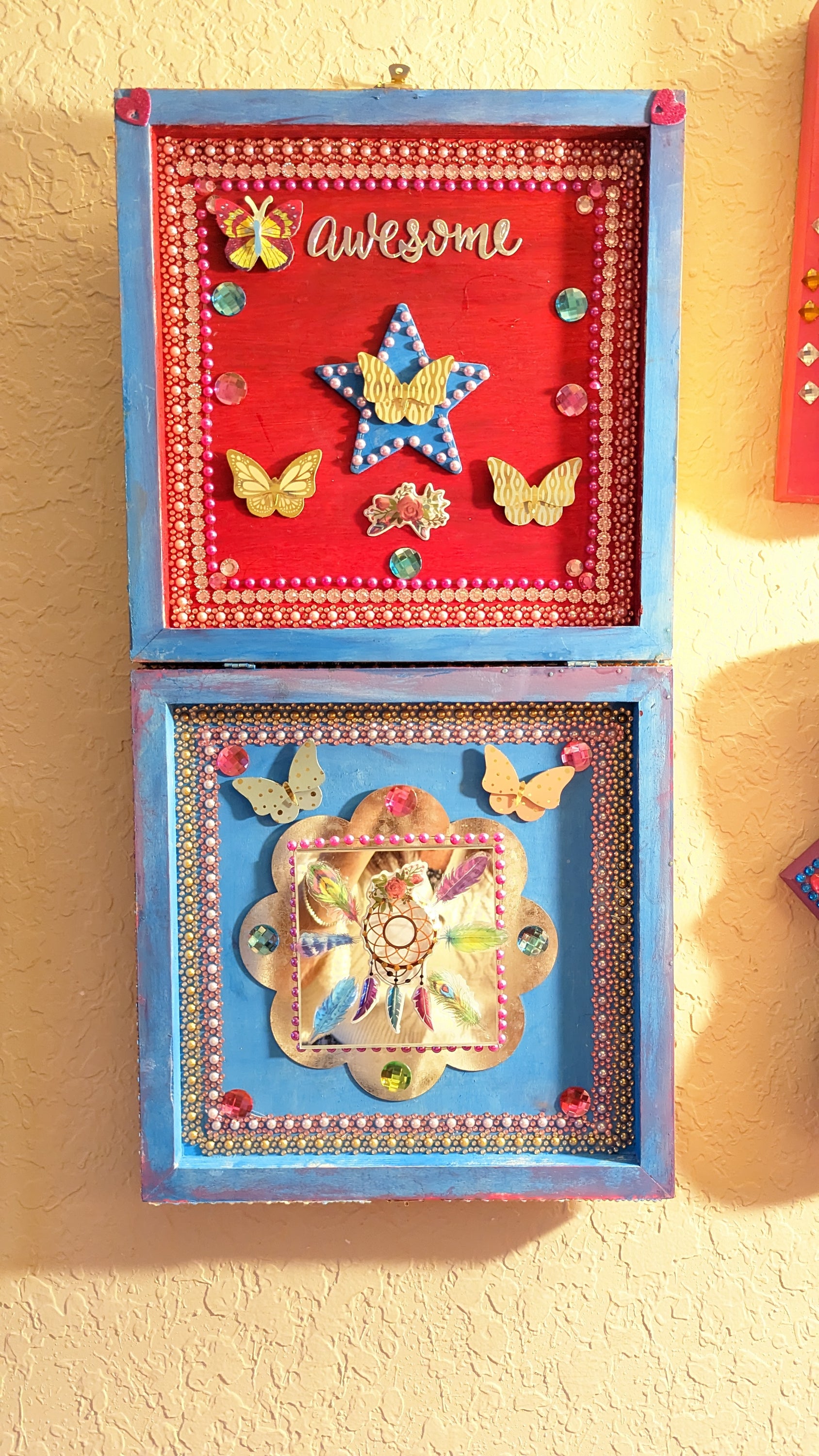 A beautifully hand-decorated Wish Box by Sharon Tatem featuring intricate designs and a powerful maiden, symbolizing dreams and magic.