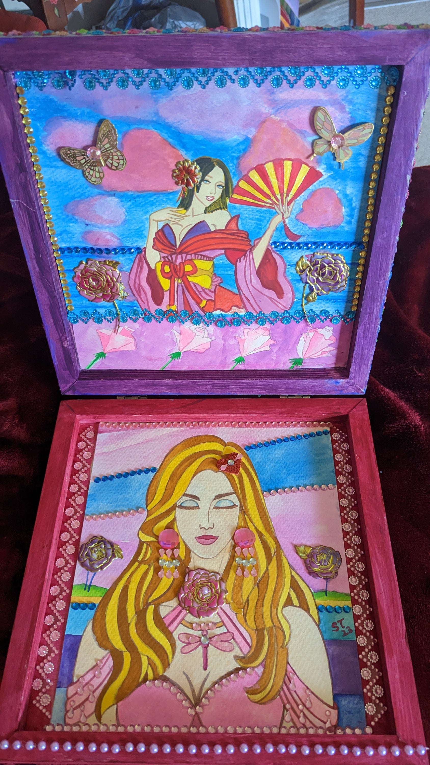 A beautifully hand-decorated Wish Box by Sharon Tatem featuring intricate designs and a powerful maiden, symbolizing dreams and wishes.