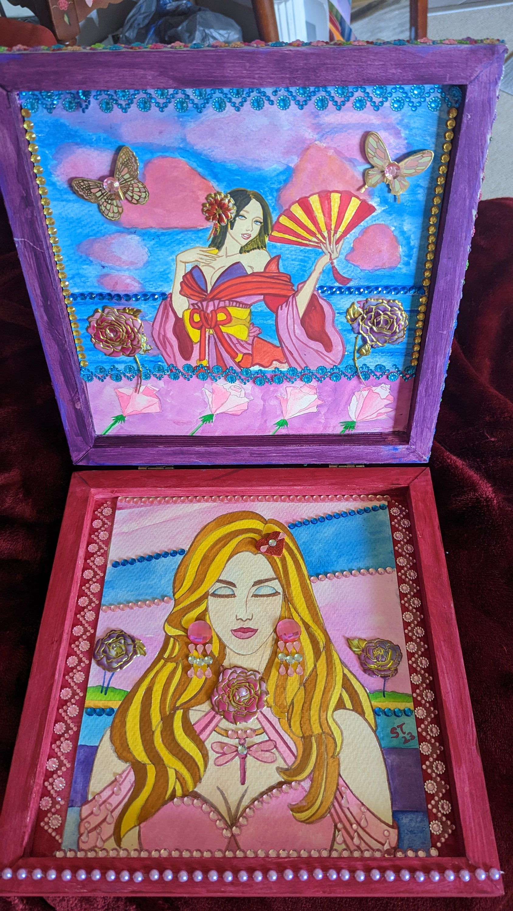 A beautifully hand-decorated Wish Box by Sharon Tatem featuring intricate designs and a powerful maiden, symbolizing dreams and wishes.