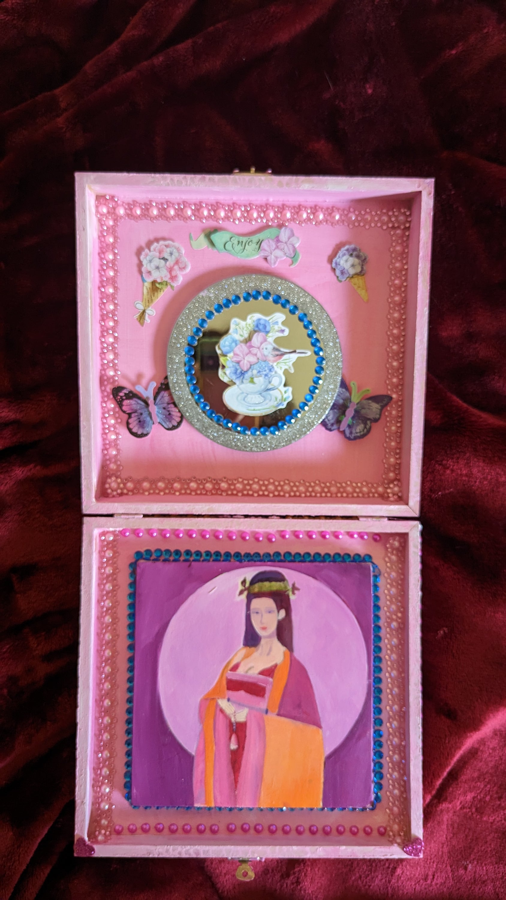 A beautifully hand-decorated Wish Box by Sharon Tatem featuring intricate designs and a powerful maiden, symbolizing dreams and wishes.