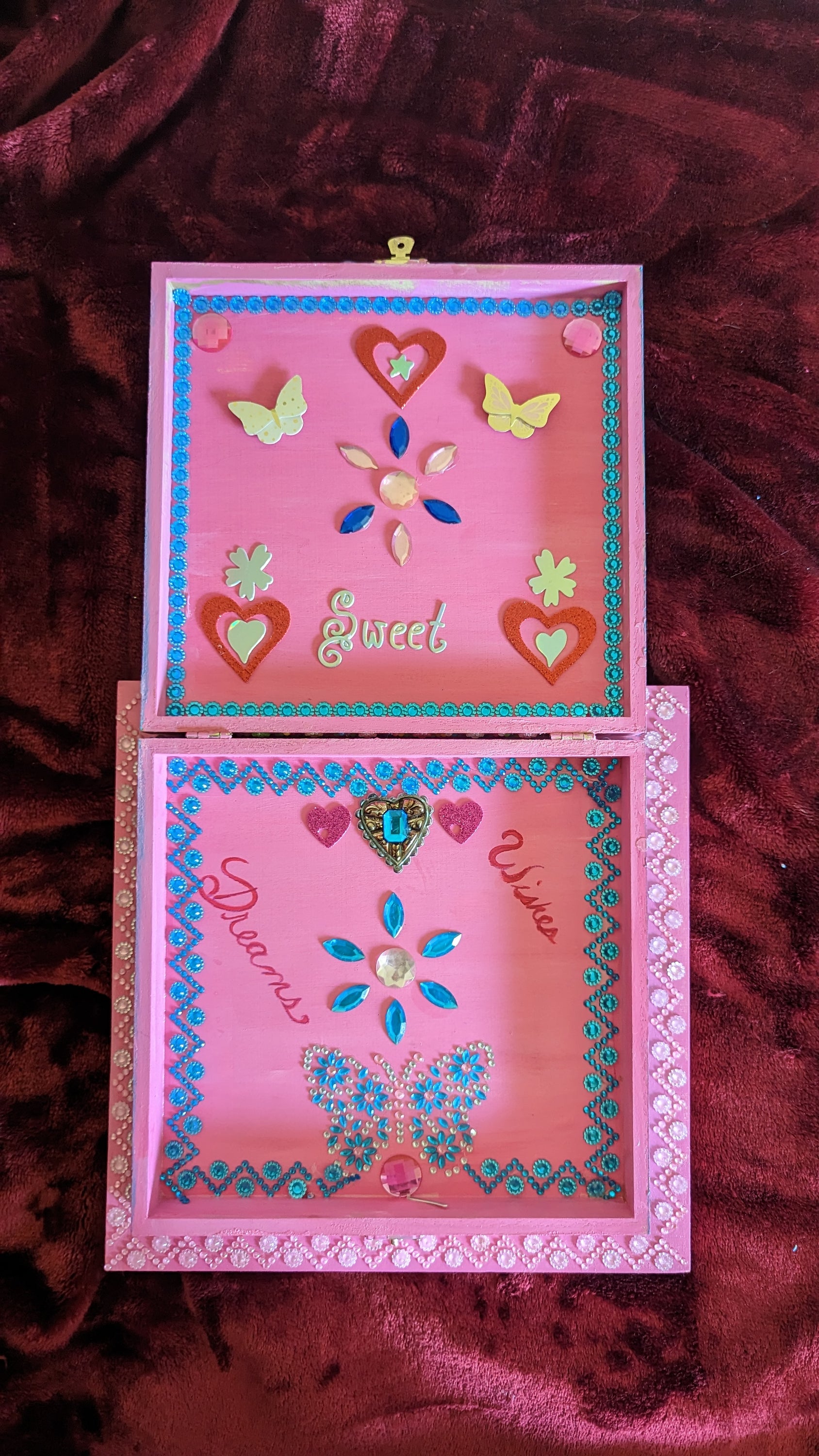 A beautifully hand-decorated Wish Box by Sharon Tatem featuring a powerful maiden, showcasing intricate designs and vibrant colors.