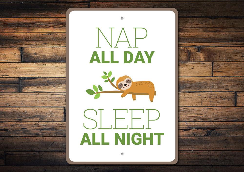 Nap All Day Sign made of durable aluminum, featuring a playful design perfect for home decor.