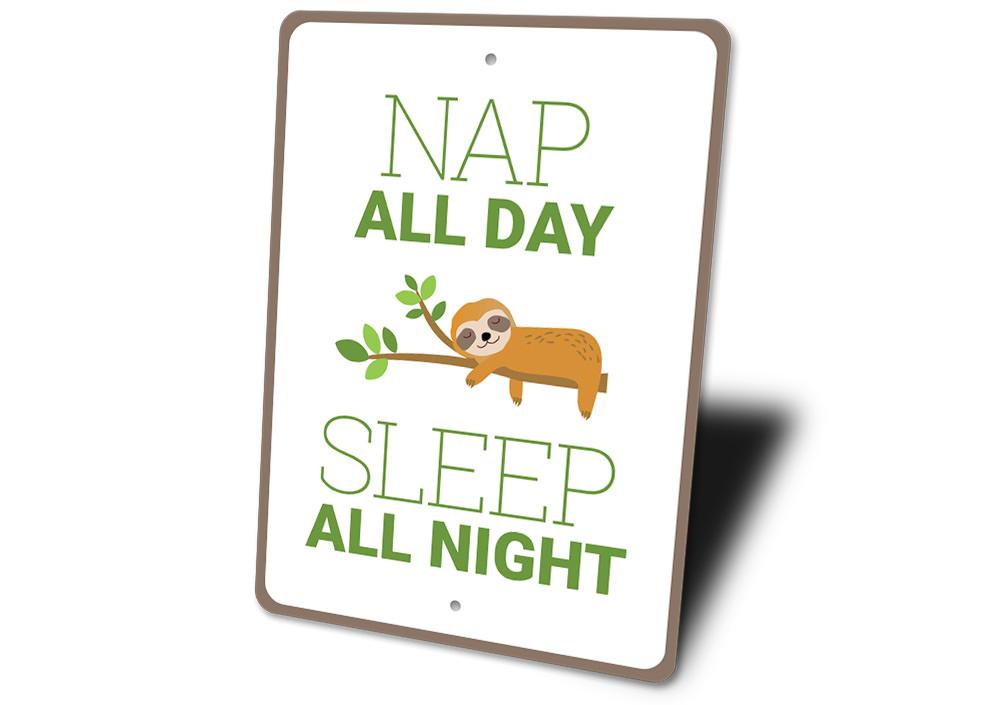 Nap All Day Sign made of durable aluminum, featuring a playful design perfect for home decor.