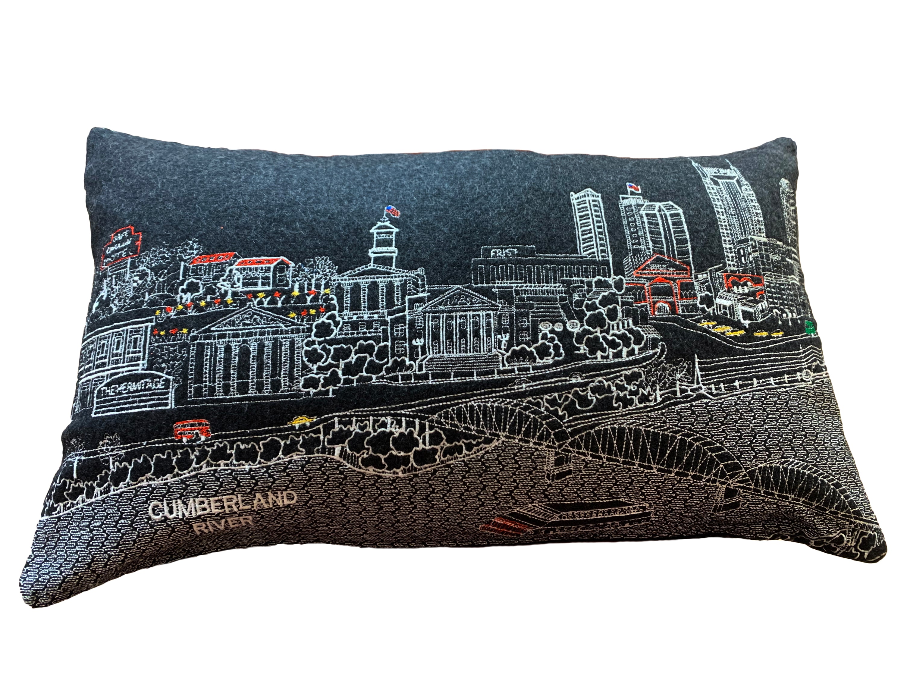 Nashville Pillow featuring embroidered cityscape design with red zipper, showcasing iconic Nashville landmarks.