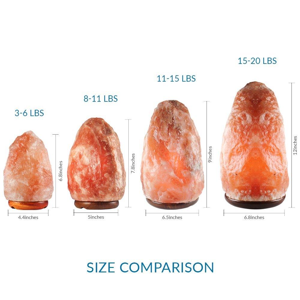 Natural Himalayan Salt Lamp, hand-carved, unique shape, glowing amber light, wooden base, 3-6 lbs.