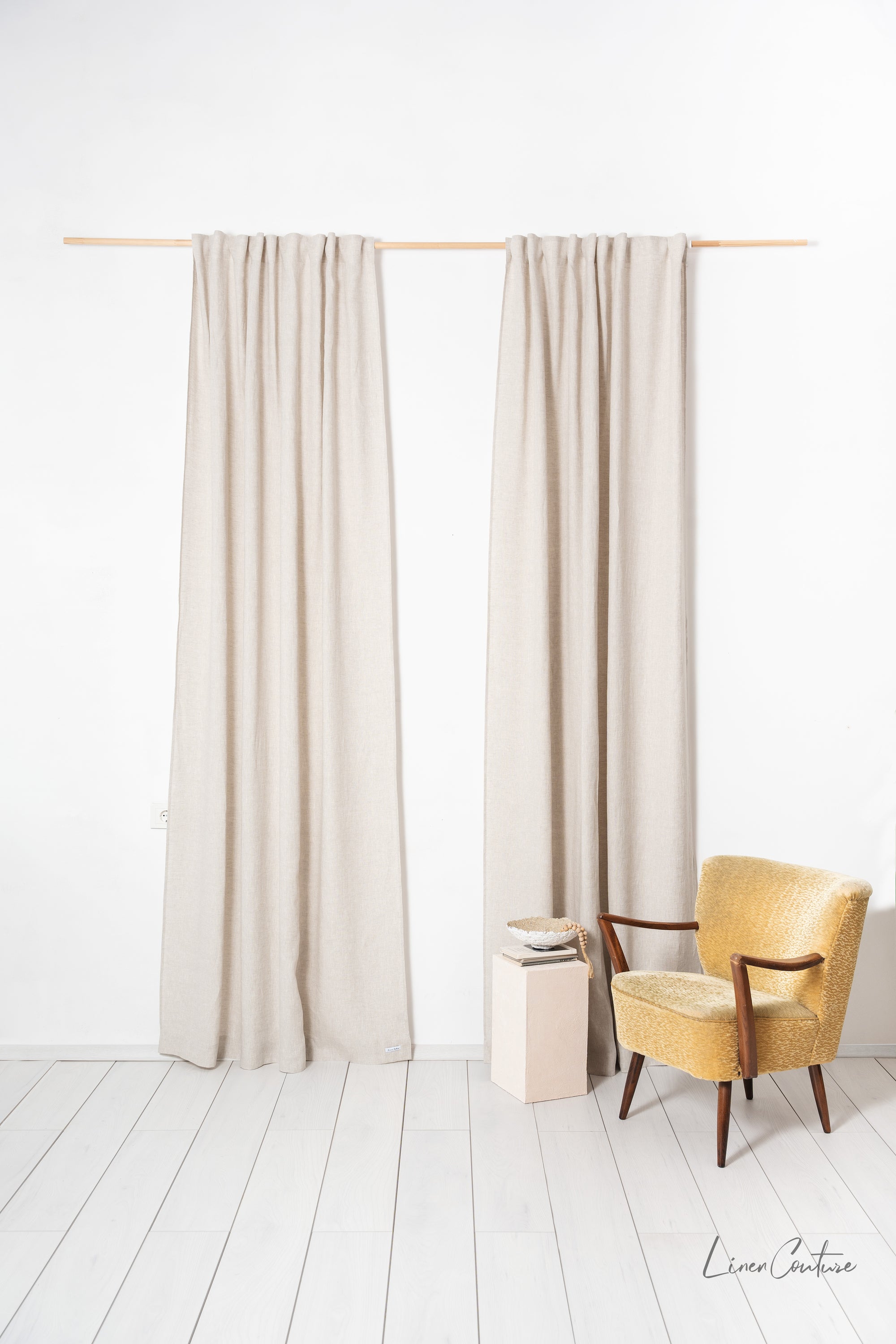 Natural Light linen curtain with multifunctional heading tape, showcasing its semi-sheer texture and elegant design in a cozy interior setting.