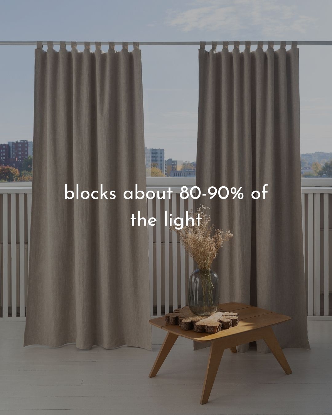 Natural linen curtain with blackout tabs, showcasing elegant design and solid color.