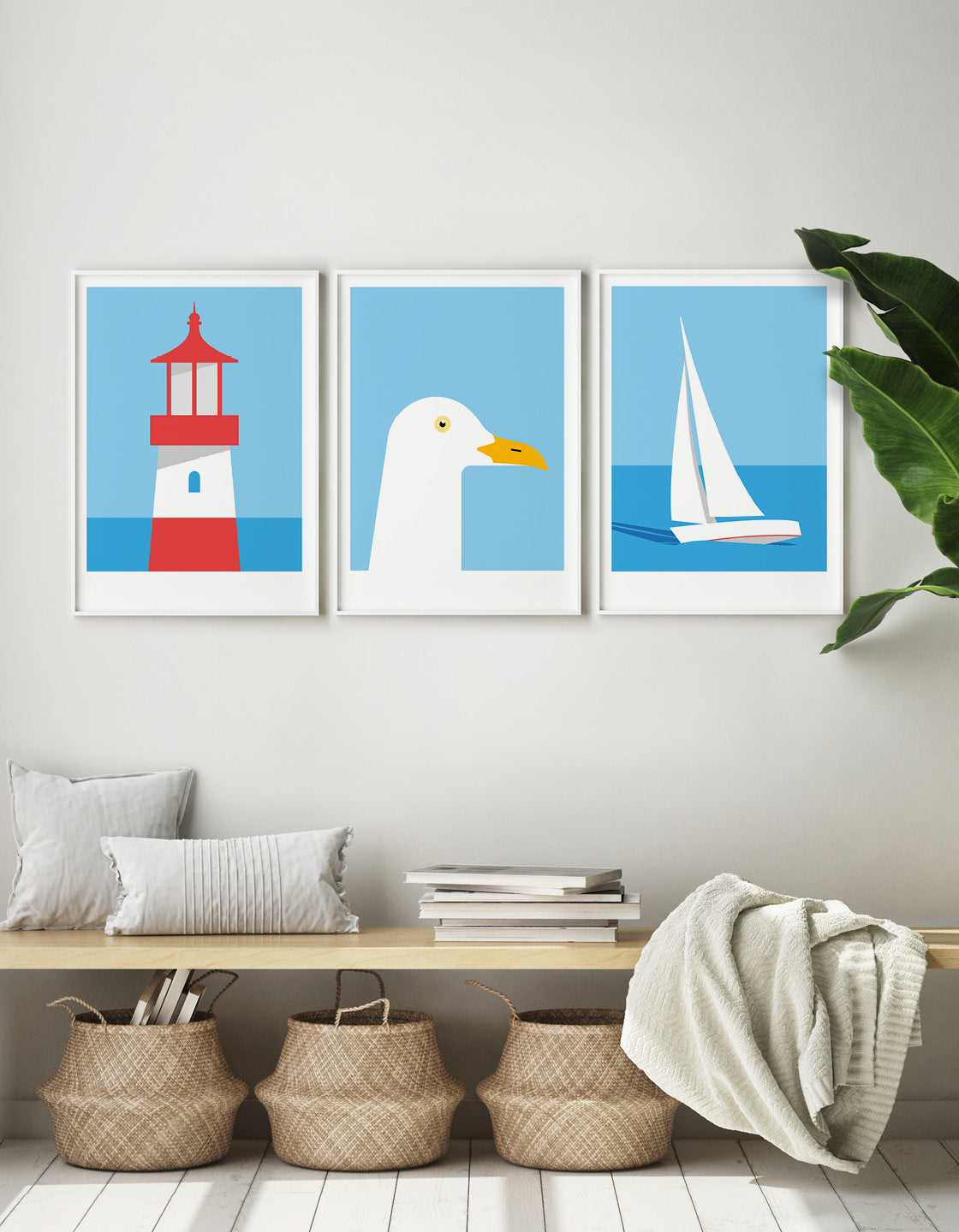 A set of three modern art prints featuring nautical themes, perfect for coastal decor.