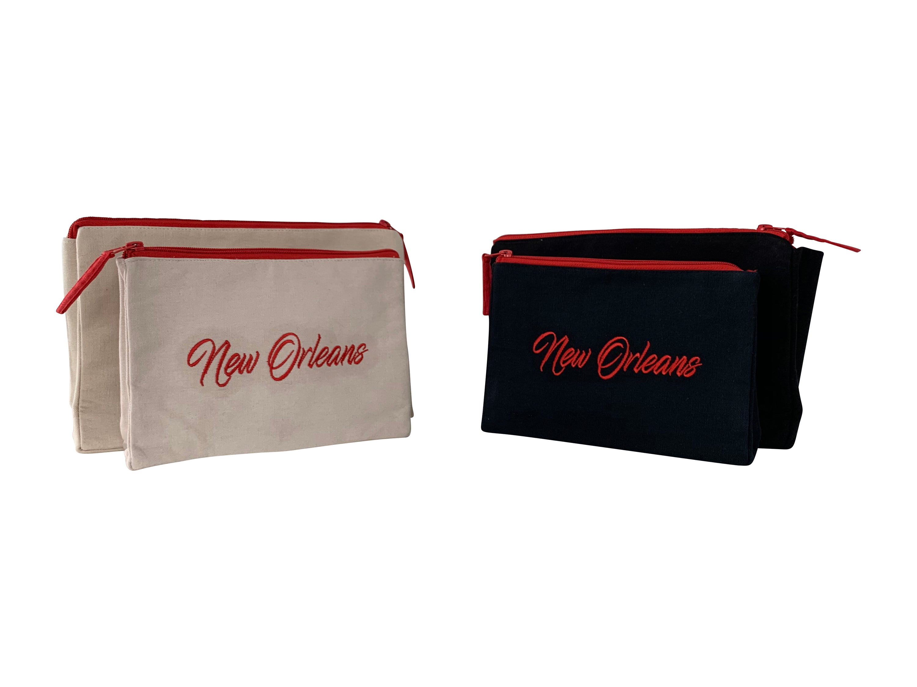 New Orleans Makeup Bag set featuring embroidered skyline on cream and black cotton canvas with red waterproof lining.