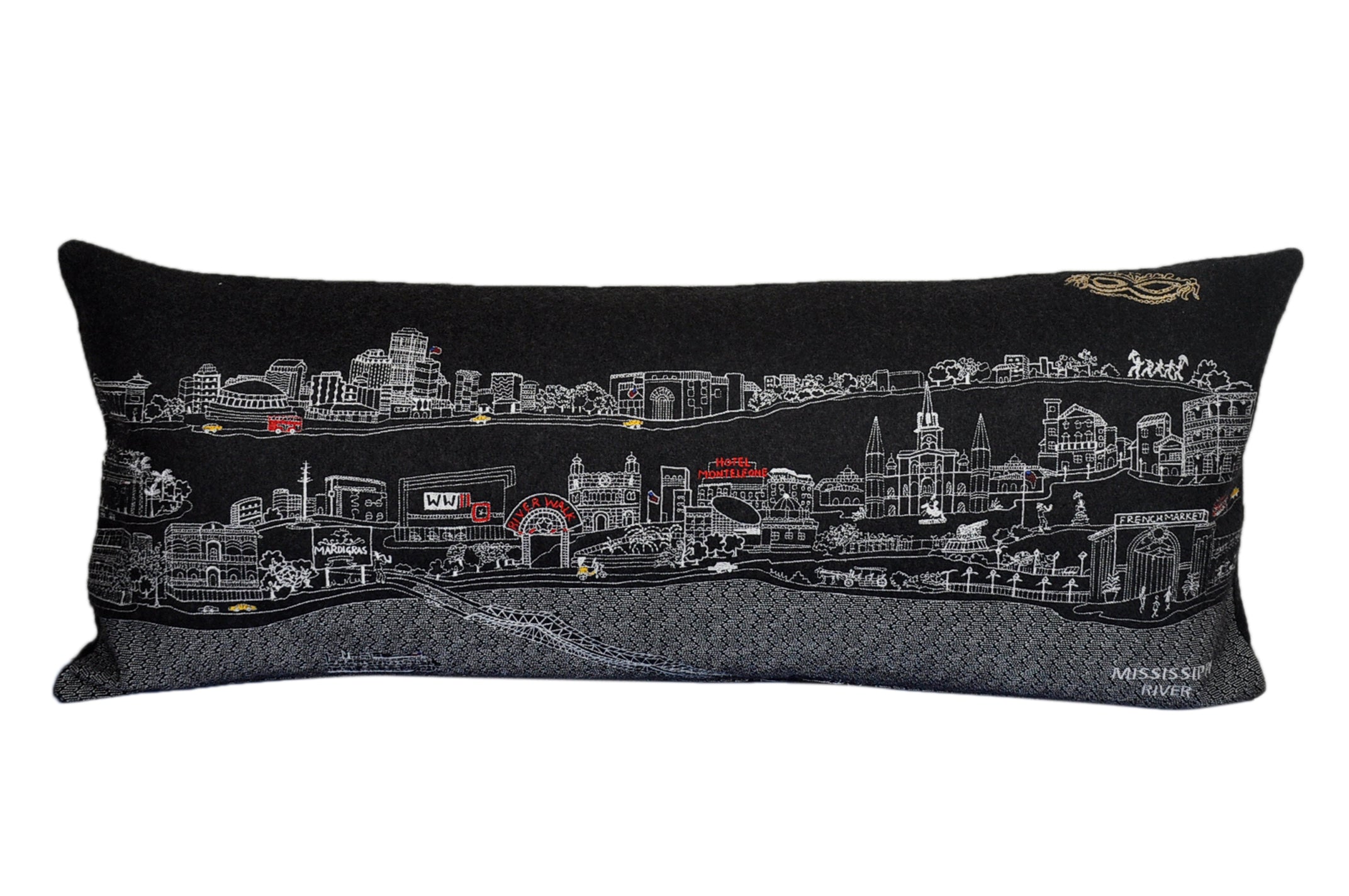 A decorative New Orleans pillow featuring vibrant embroidery inspired by the city's architecture and culture, with a red zipper at the bottom.