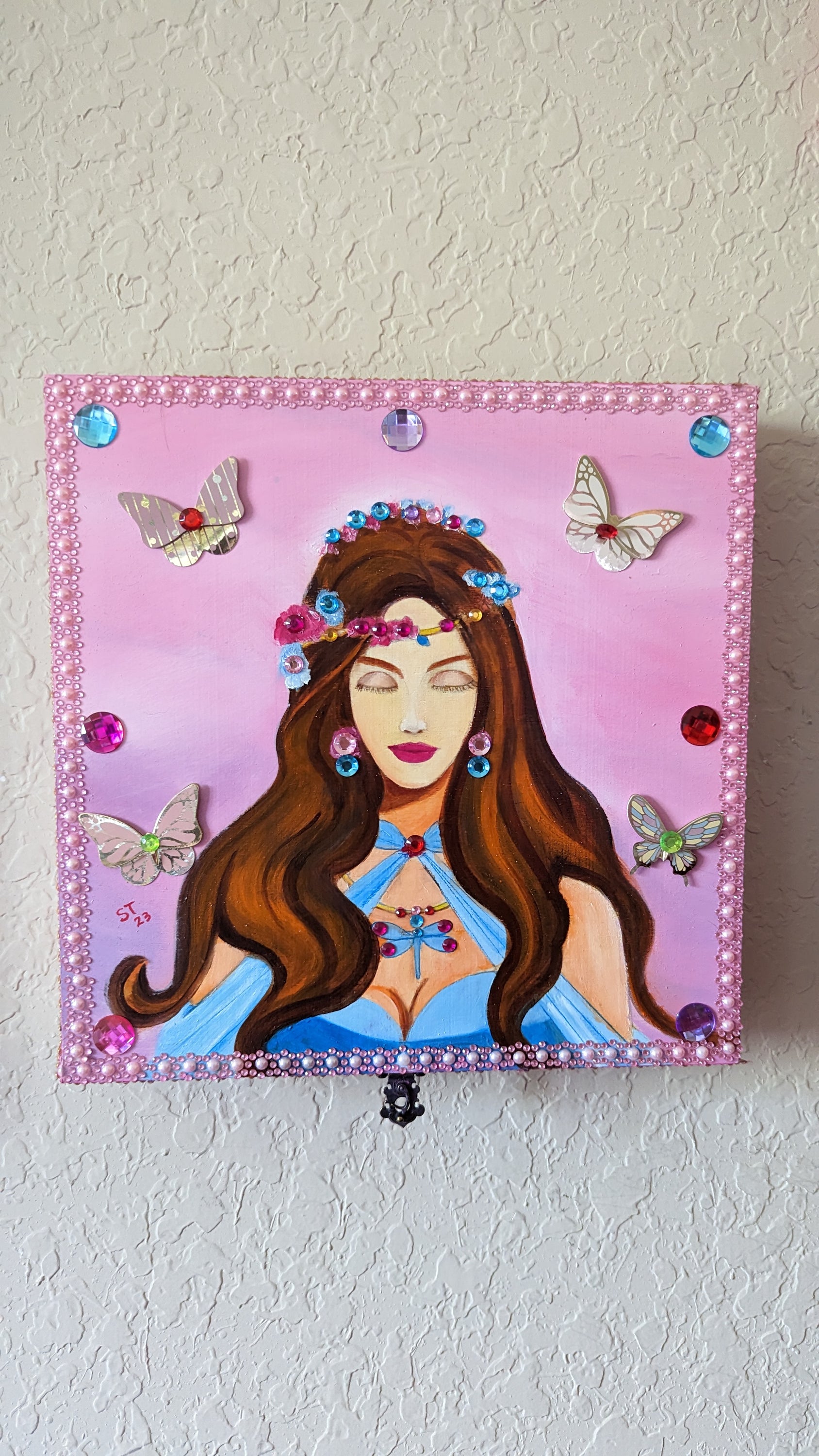 A beautifully hand-decorated Wish Box by Sharon Tatem featuring a unique maiden design, symbolizing dreams and magic.