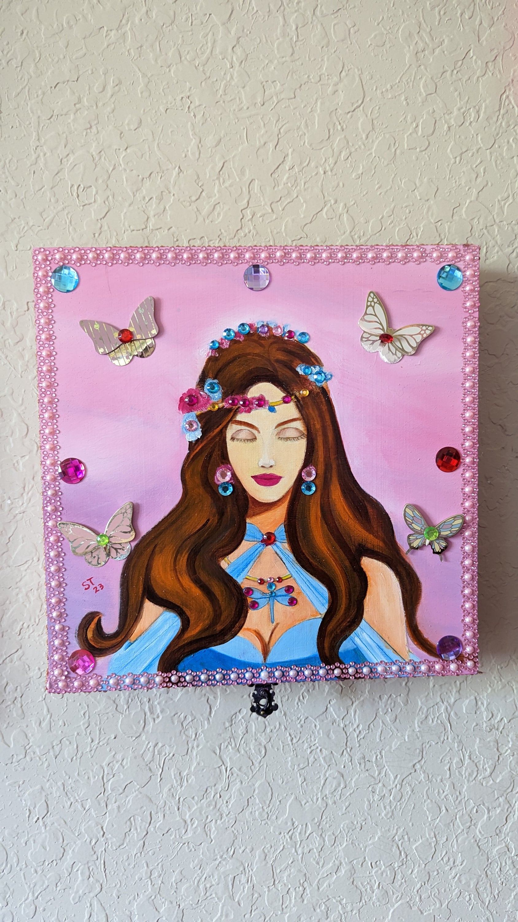 A beautifully hand-decorated Wish Box by Sharon Tatem featuring a unique maiden design, symbolizing dreams and magic.