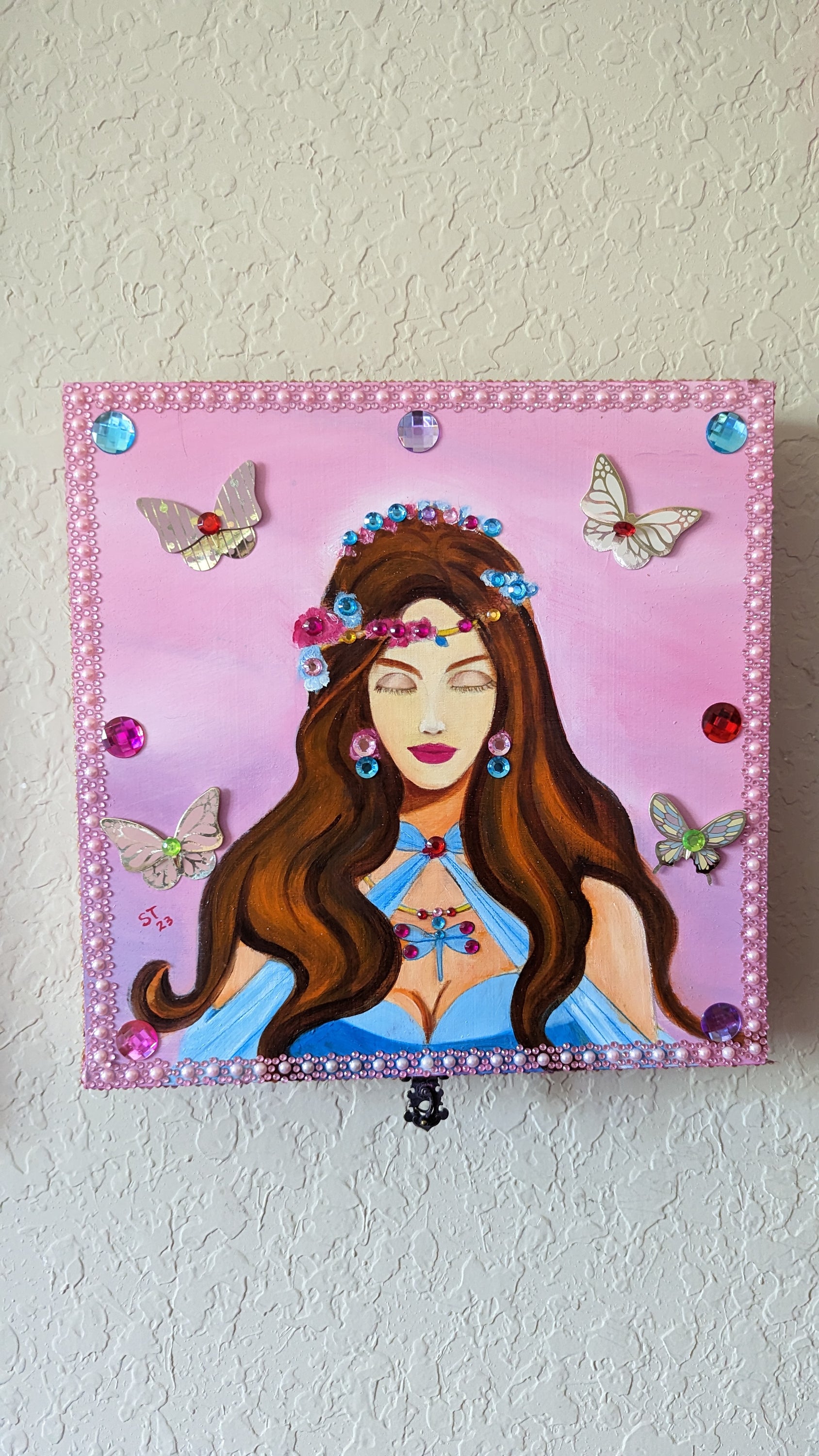 A beautifully hand-decorated Wish Box by Sharon Tatem featuring a unique maiden design, symbolizing dreams and magic.