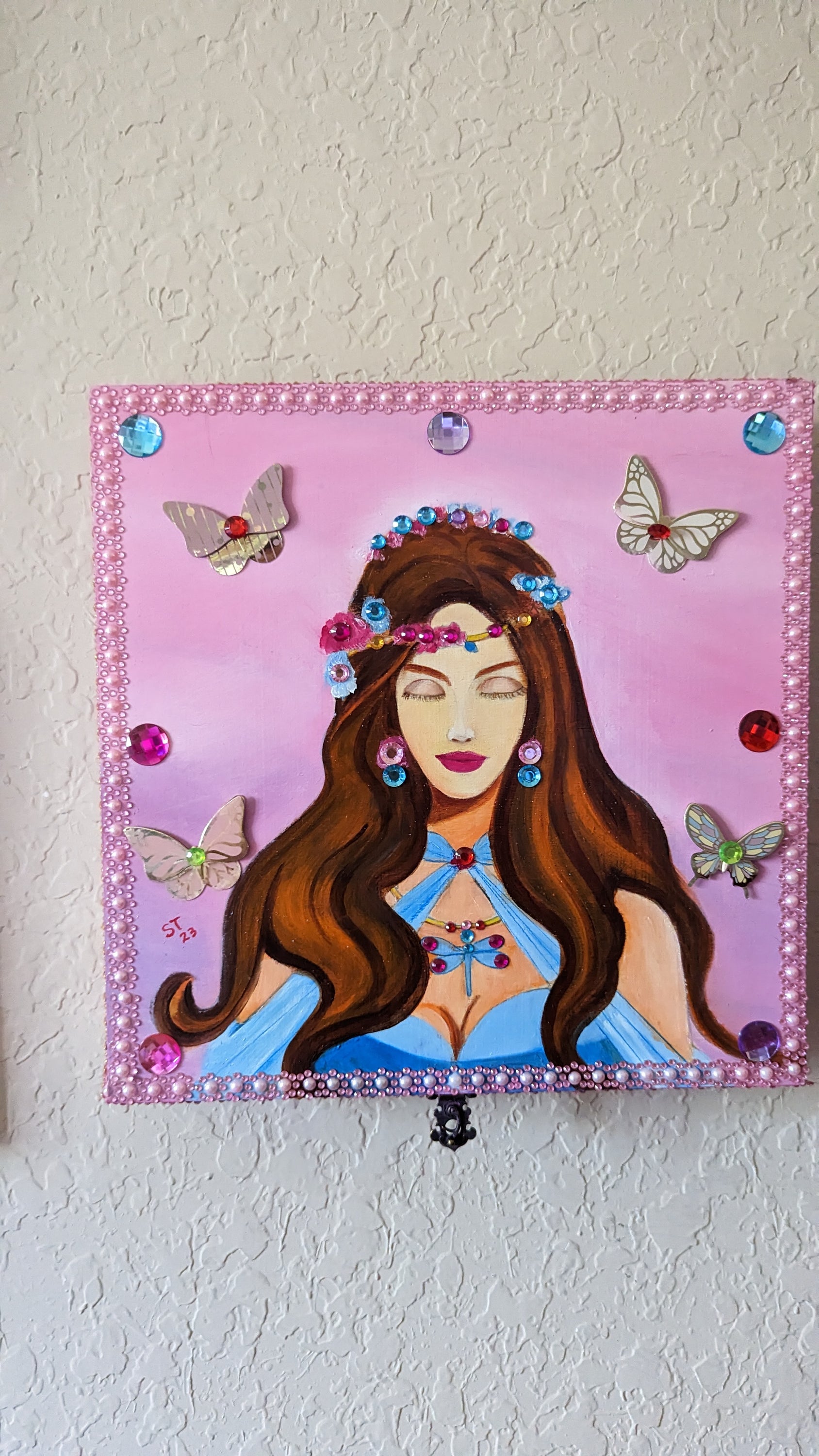 A beautifully hand-decorated Wish Box by Sharon Tatem featuring a unique maiden design, symbolizing dreams and magic.