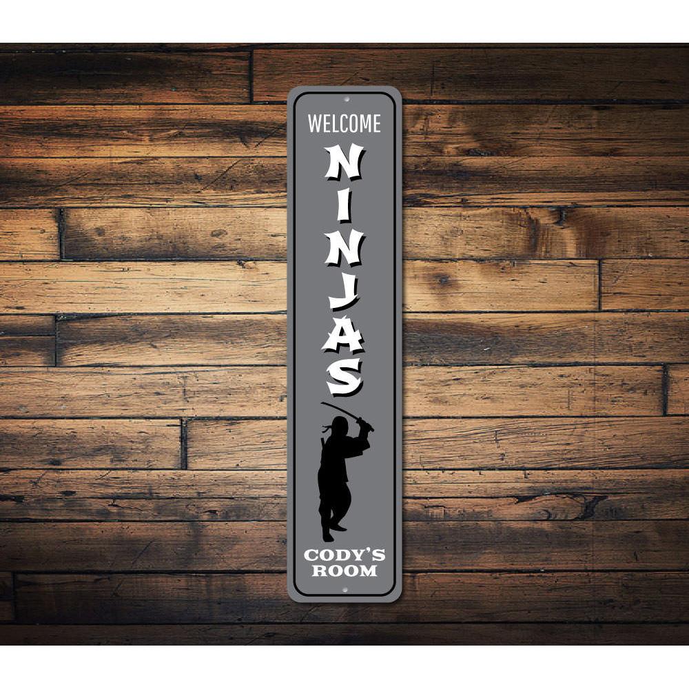 Ninjas Vertical Sign featuring vibrant ninja graphics, perfect for children's room decor, made from durable aluminum.