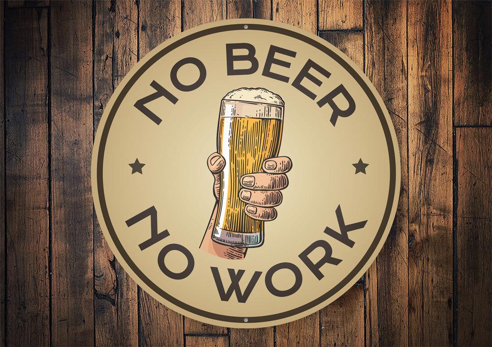 A humorous No Beer No Work Sign made of high-quality aluminum, featuring bold text and a decorative design, perfect for man caves and home bars.