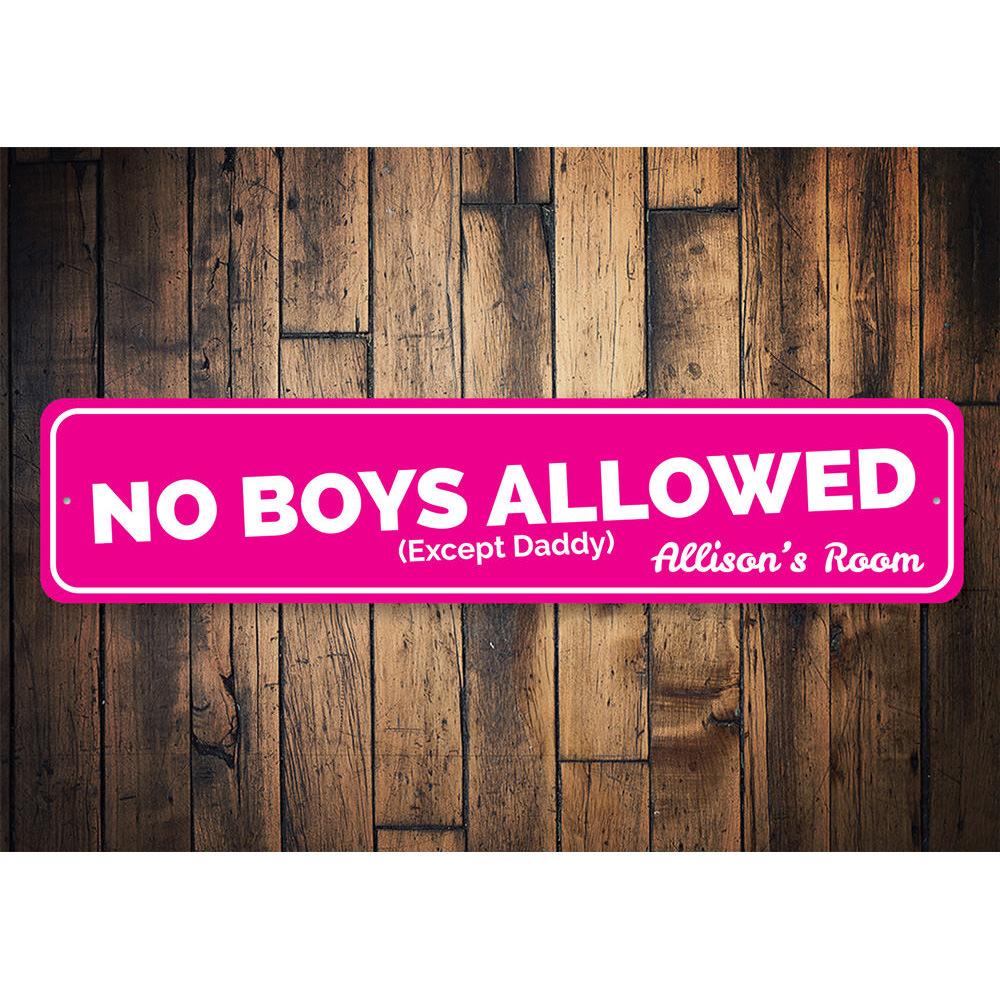 A decorative 'No Boys Allowed Except Daddy' sign made of high-quality aluminum, featuring playful typography and a charming design suitable for children's rooms.