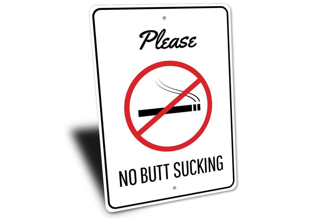 A humorous No Butt Sucking Sign made of high-quality aluminum, featuring bold text and a decorative design, perfect for home or office decor.