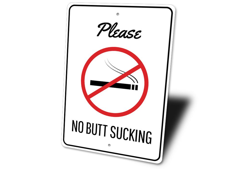 A humorous No Butt Sucking Sign made of high-quality aluminum, featuring bold text and a decorative design, perfect for home or office decor.