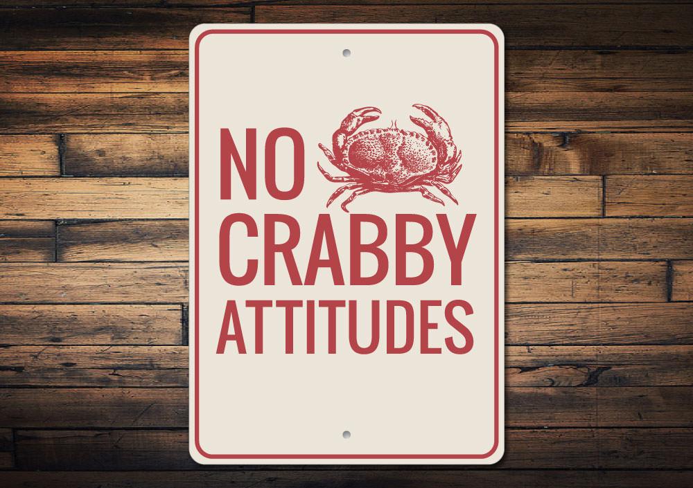 No Crabby Attitudes Sign made of aluminum, featuring a beach-themed design, perfect for coastal decor.