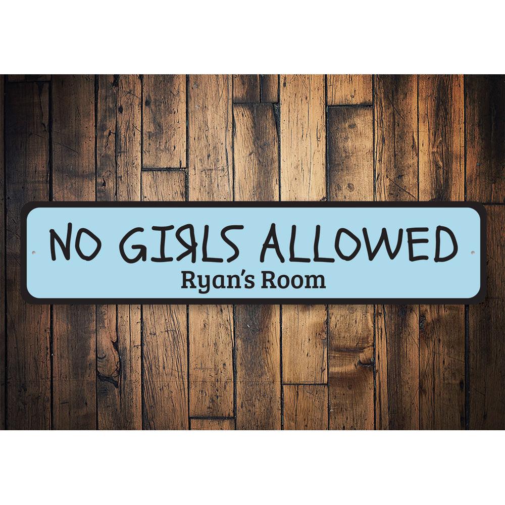 A decorative No Girls Allowed Sign made of high-quality aluminum, featuring a playful design perfect for kids' rooms.