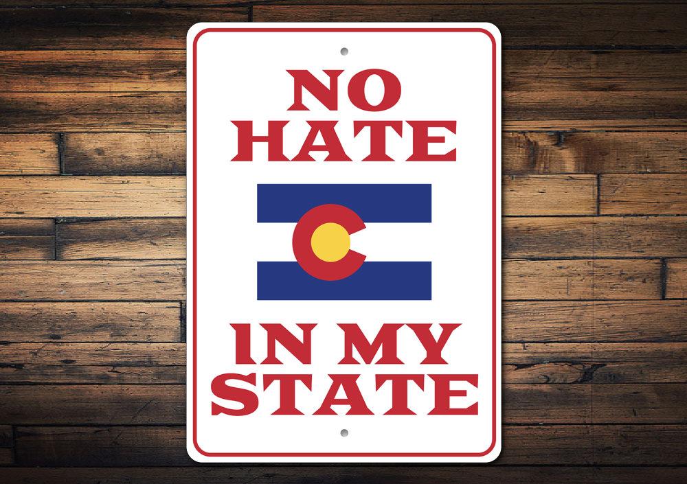 A decorative No Hate in My State sign made of high-quality aluminum, featuring a bold and colorful design promoting inclusivity.