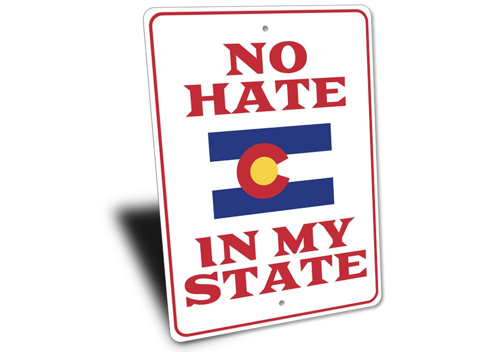 A decorative No Hate in My State sign made of high-quality aluminum, featuring a bold and colorful design promoting inclusivity.