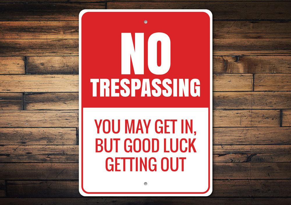 A decorative No Trespassing Sign made of high-quality aluminum, featuring customizable text and pre-drilled holes for easy mounting.