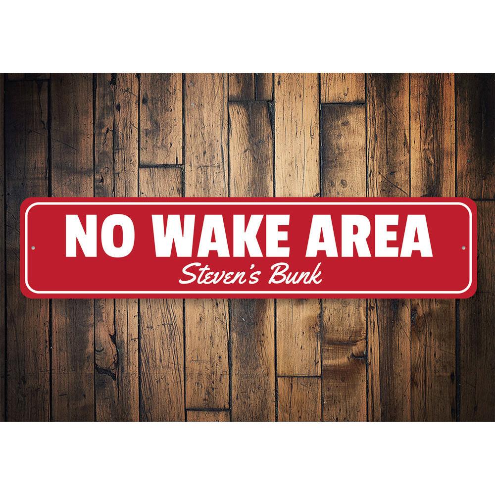 A No Wake Area Sign made of durable aluminum, featuring clear text and vibrant colors, designed for safety on the water.