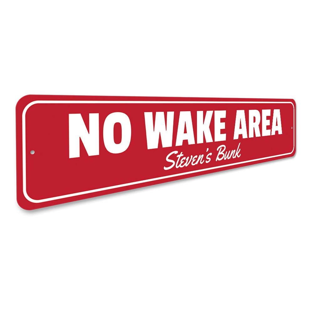 A No Wake Area Sign made of durable aluminum, featuring clear text and vibrant colors, designed for safety on the water.