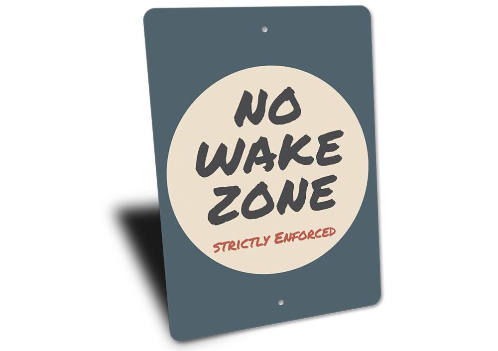 A vibrant No Wake Zone Sign made from durable aluminum, featuring customizable text and pre-drilled holes for easy mounting, perfect for lakeside properties.