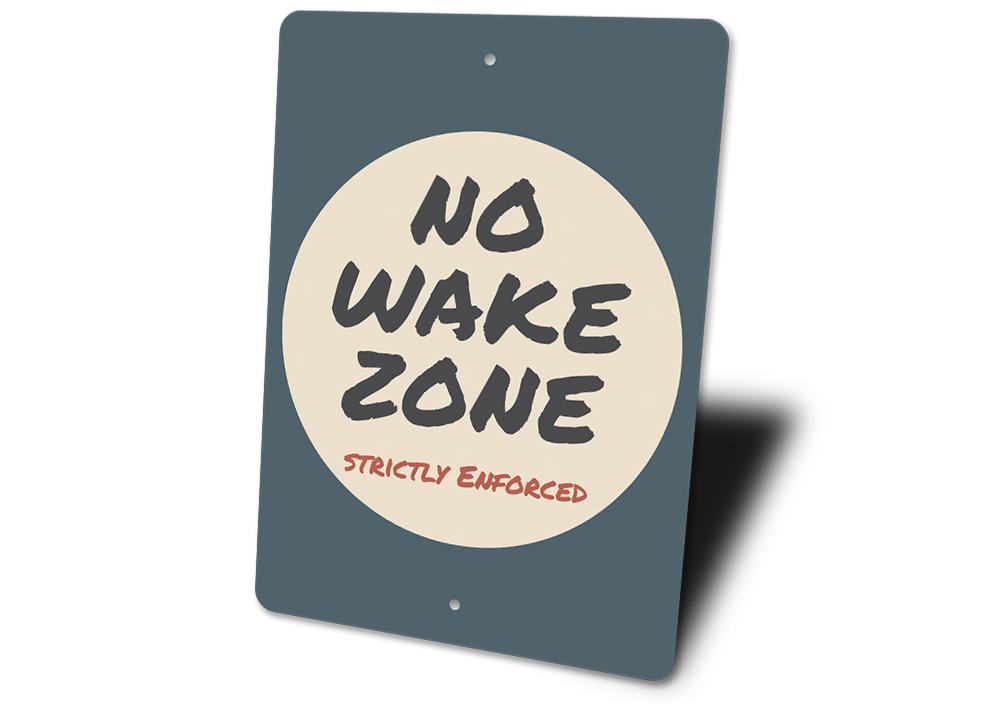 A vibrant No Wake Zone Sign made from durable aluminum, featuring customizable text and pre-drilled holes for easy mounting, perfect for lakeside properties.