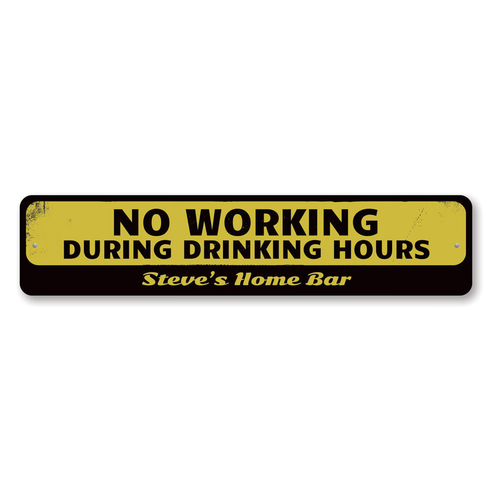 A humorous No Working During Drinking Hours Sign made of high-quality aluminum, featuring bold lettering and a decorative design, perfect for home bars and man caves.