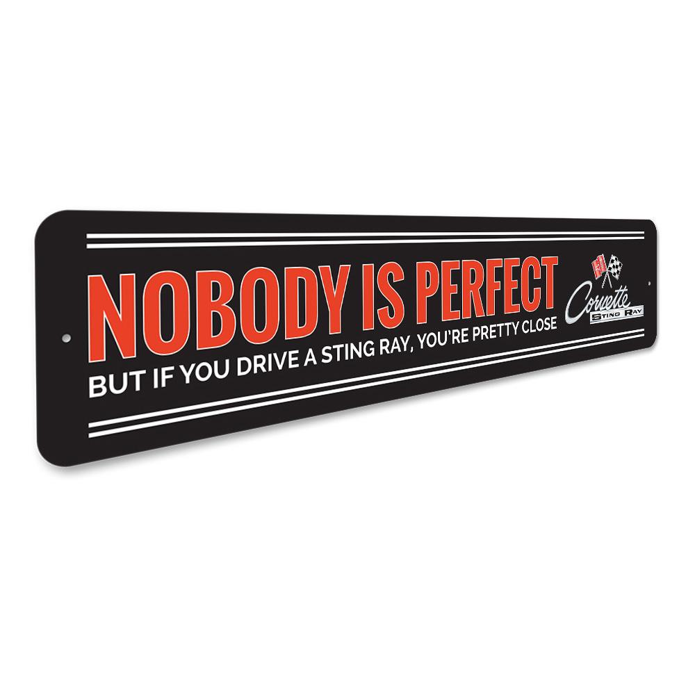 Nobody Is Perfect Chevy Corvette Sign made of durable aluminum, featuring a humorous design perfect for home decor.