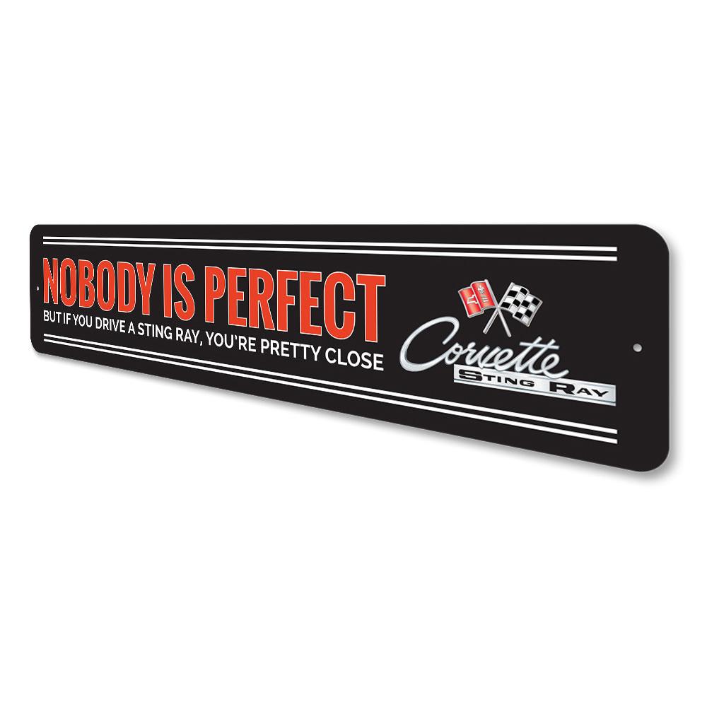 Nobody Is Perfect Chevy Corvette Sign made of durable aluminum, featuring a humorous design perfect for home decor.