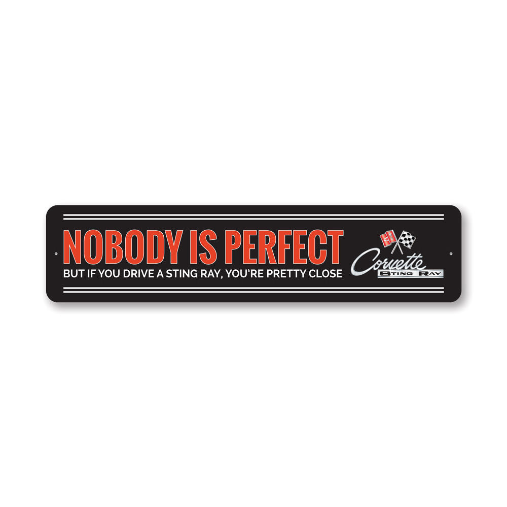 Nobody Is Perfect Chevy Corvette Sign made of durable aluminum, featuring a humorous design perfect for home decor.