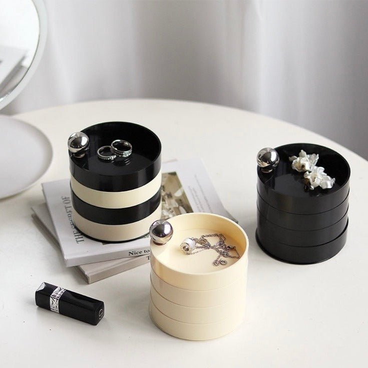 Nordic Style Revolving Accessories Storage Box with multiple compartments and a sleek design, perfect for organizing jewelry and enhancing home decor.