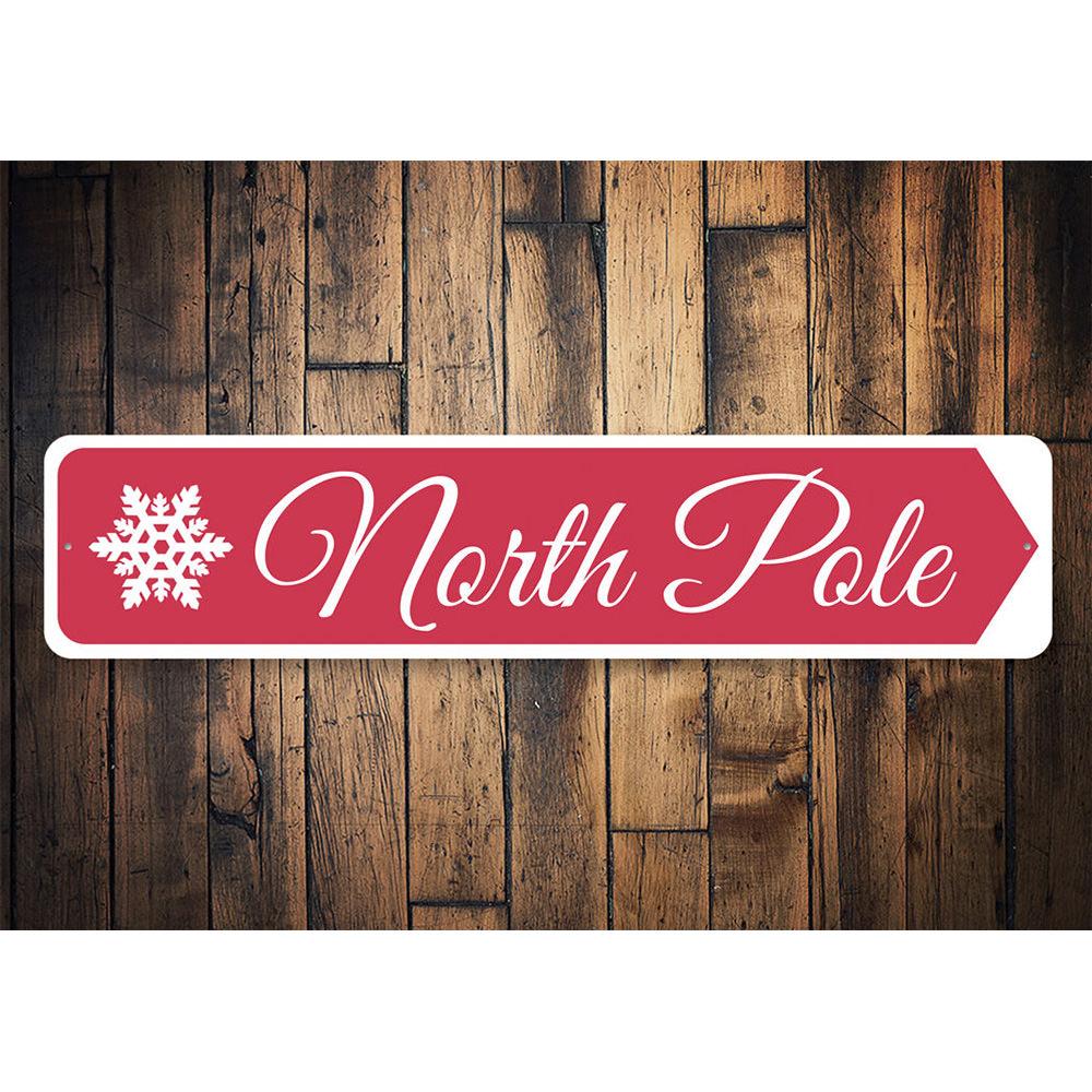 North Pole Snowflake Sign featuring a festive snowflake design, perfect for holiday decorations.