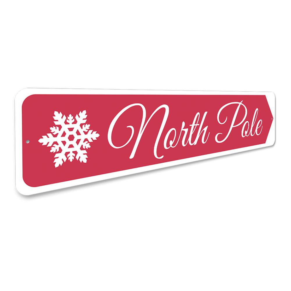 North Pole Snowflake Sign featuring a festive snowflake design, perfect for holiday decorations.