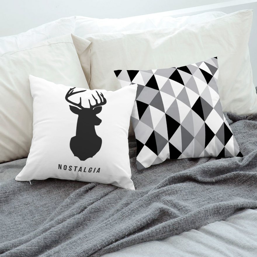 Nostalgia cushion featuring a double-sided design in high-quality microfiber, showcasing vibrant colors and patterns.