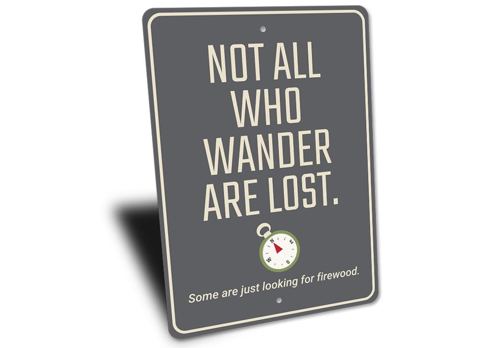 A decorative metal sign reading 'Not All Who Wander are Lost', showcasing a rustic design suitable for home decor.