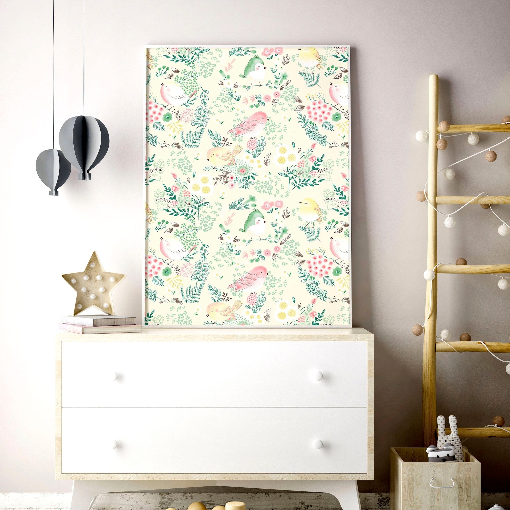 Set of 2 nursery wall art prints featuring cute pink and ivory birds and a floral illustration, perfect for a little girl's room.