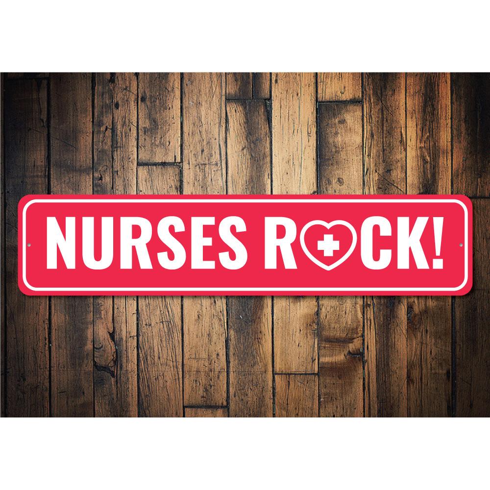 A decorative Nurses Rock Sign made of durable aluminum, featuring vibrant colors and customizable text, perfect for celebrating nurses.